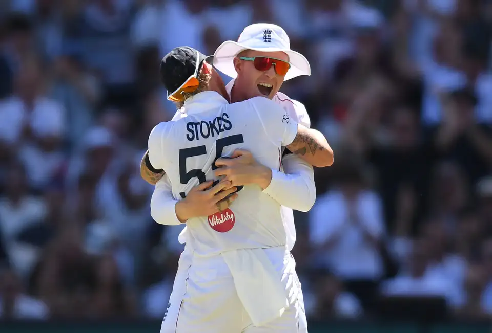 Zak Crawley and Ben Stokes embrace after the former took a stunner to dispatch Travis Head on Day 1 of the Adelaide Ashes Test